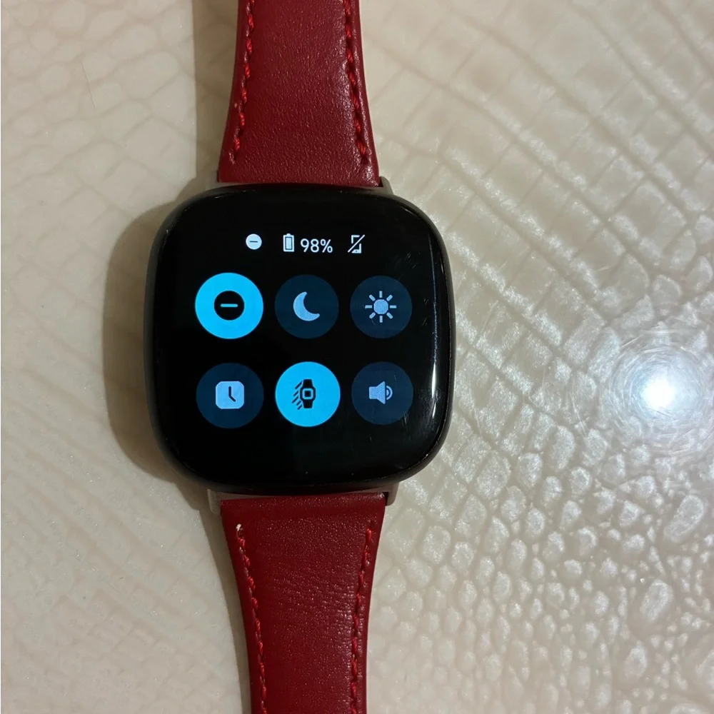 Fitbit Smartwatch with Red Strap